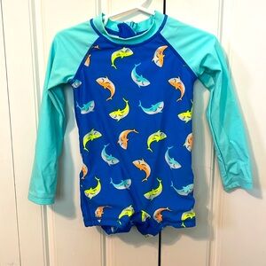 Baby swim outfit. Blue with sharks and a zipper.